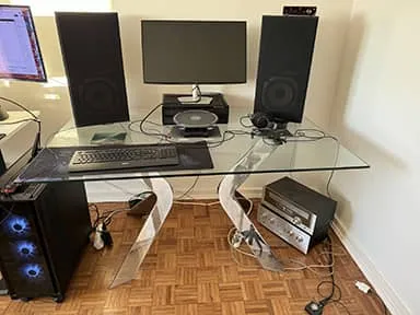 Glass table W 150 cm x L 90cm x H 76 cm with metal legs on sides